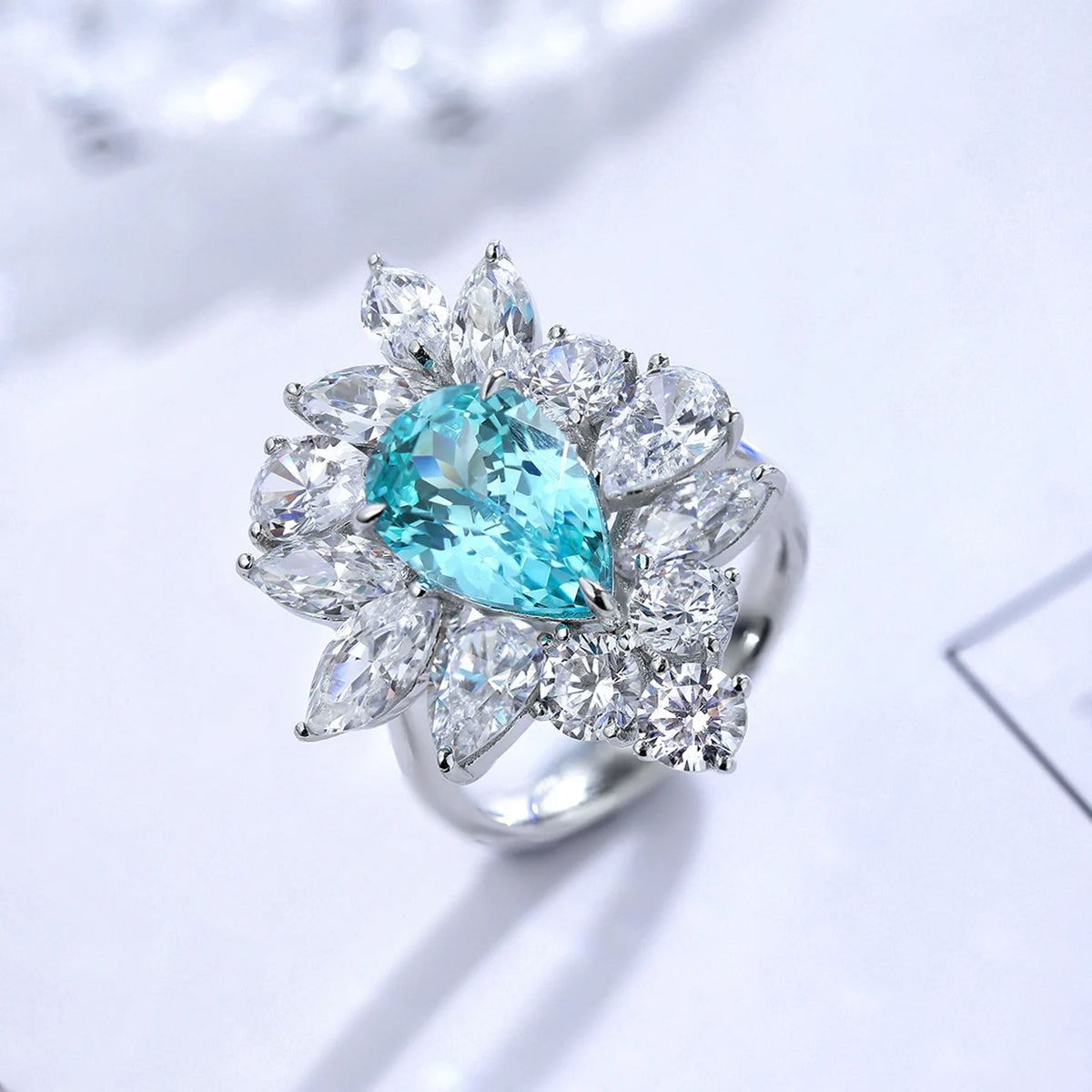 Bague de fiançailles classique MUSHAN pour femme, en argent sterling 925 plaqué or 18 carats, ornée d'une émeraude ronde de laboratoire bleu-vert.