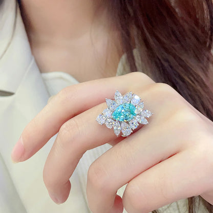Bague de fiançailles classique MUSHAN pour femme, en argent sterling 925 plaqué or 18 carats, ornée d'une émeraude ronde de laboratoire bleu-vert.