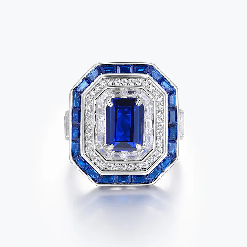 Anillo de compromiso para mujer de la marca MuShan, elaborado en plata de ley 925 con zafiro creado en laboratorio, corte princesa y chapado en oro de 18 quilates, incluye set de limpieza.