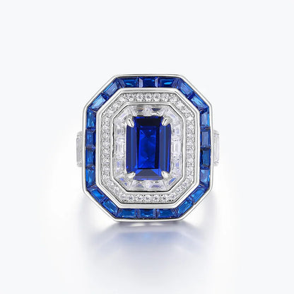 Anillo de compromiso para mujer de la marca MuShan, elaborado en plata de ley 925 con zafiro creado en laboratorio, corte princesa y chapado en oro de 18 quilates, incluye set de limpieza.