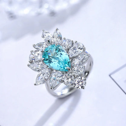 Bague de fiançailles classique MUSHAN pour femme, en argent sterling 925 plaqué or 18 carats, ornée d'une émeraude ronde de laboratoire bleu-vert.