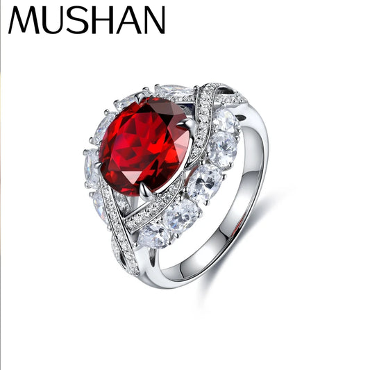 Anillo de compromiso MUSHAN de plata de ley 925 con zafiro rojo creado en laboratorio, corte ovalado, para mujer, chapado en oro de 18K, anillo de aniversario