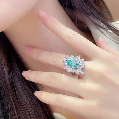 Bague de fiançailles classique MUSHAN pour femme, en argent sterling 925 plaqué or 18 carats, ornée d'une émeraude ronde de laboratoire bleu-vert.