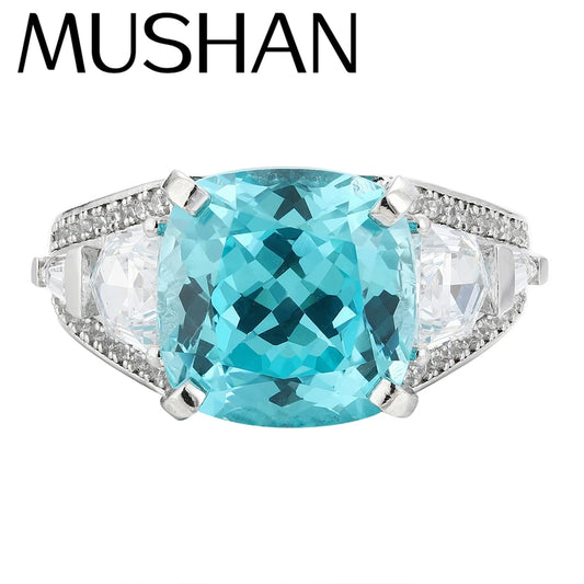 Anillo de plata de ley 925 personalizado MUSHAN con zafiro azul creado en laboratorio, redondo, para fiesta de bodas de mujer, anillo de aniversario chapado en oro de 18 quilates
